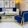 Fauteuil retro en velours bleu avec socle et accoudoir en Acier Inoxydable Couleur Or