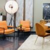 Fauteuil style industriel en simili cuir orange avec cadre en métal époxy couleur noir