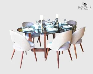 Table à manger DAX en bois hêtre massif vernis noyer avec plateau en verre trempé clair de 12mm en forme de galet.