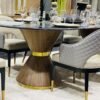 Chaise tendance en toile grise et dossier matelassé avec piètement en bois et Acier Inoxydable Couleur Or.