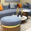 Tabouret chic en bois noyer et assise en toile crise avec bande en laiton véritable.